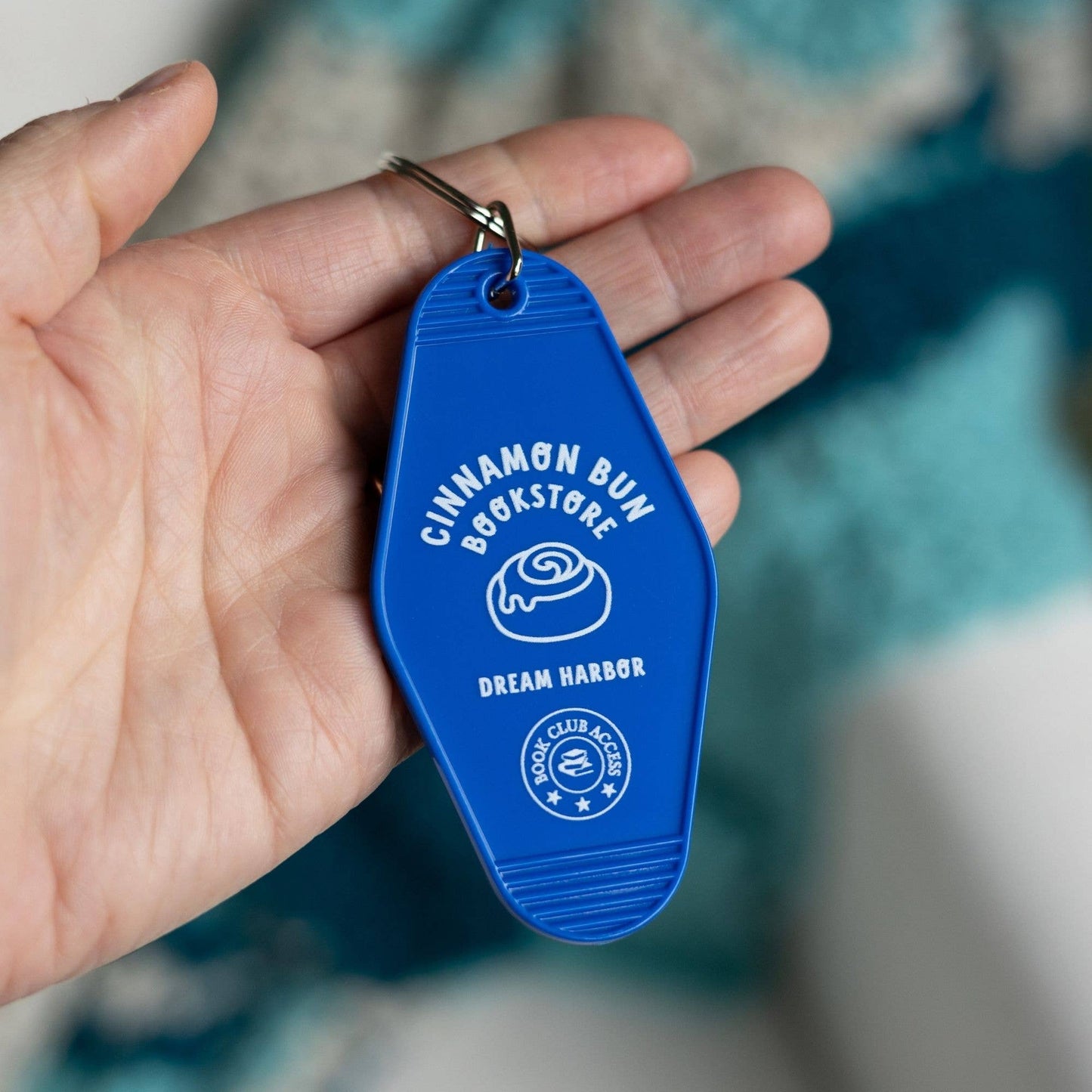 Cinnamon Bun Book Store Motel Keychain | Dream Harbor