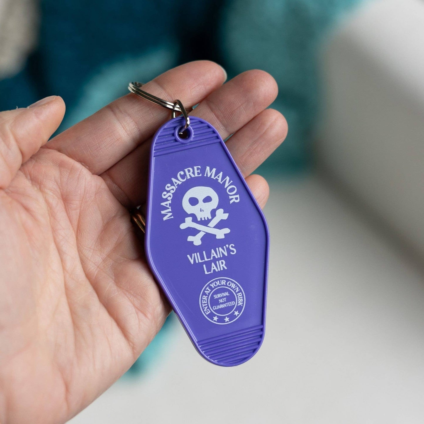 Massacre Manor Motel Keychain | Assistant to the Villain