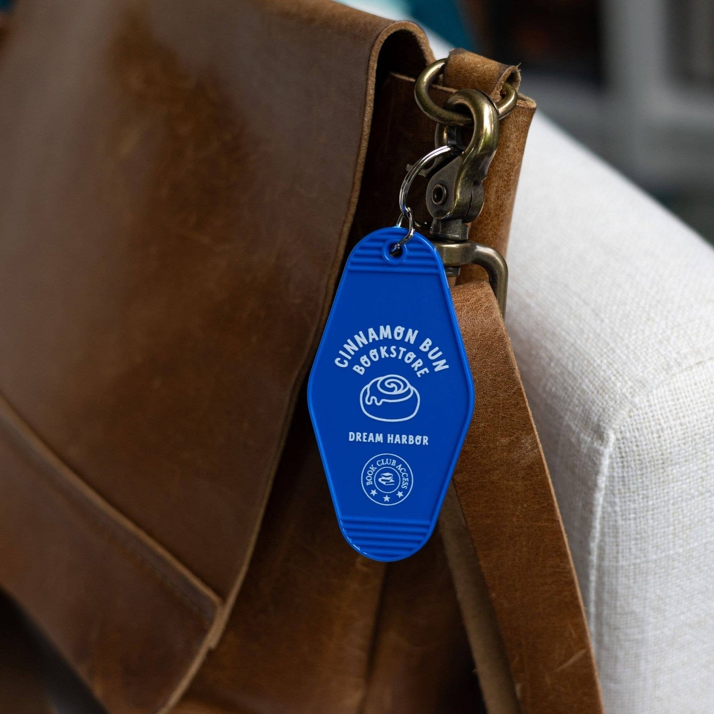 Cinnamon Bun Book Store Motel Keychain | Dream Harbor